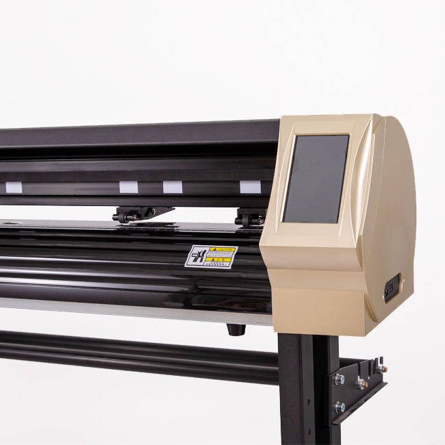 Vinyl cutting plotter trimming a roll of green film